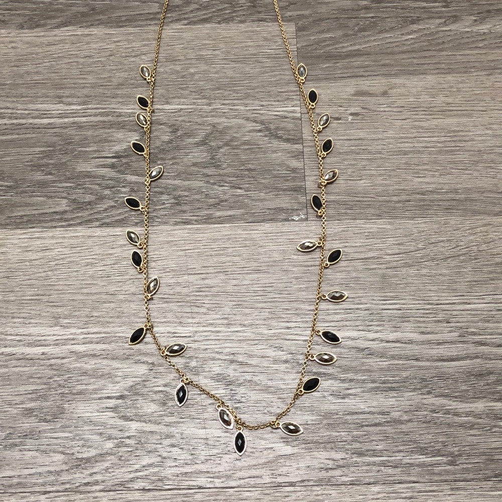 Gold Colored Necklace with Gray and Black Charms
